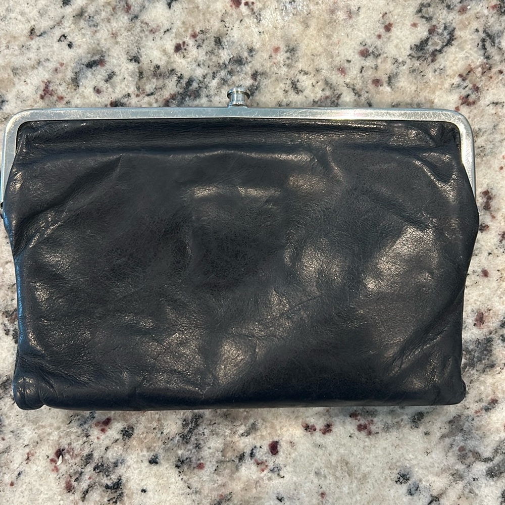 HOBO Lauren clutch wallet. Black leather exterior. Good condition.
